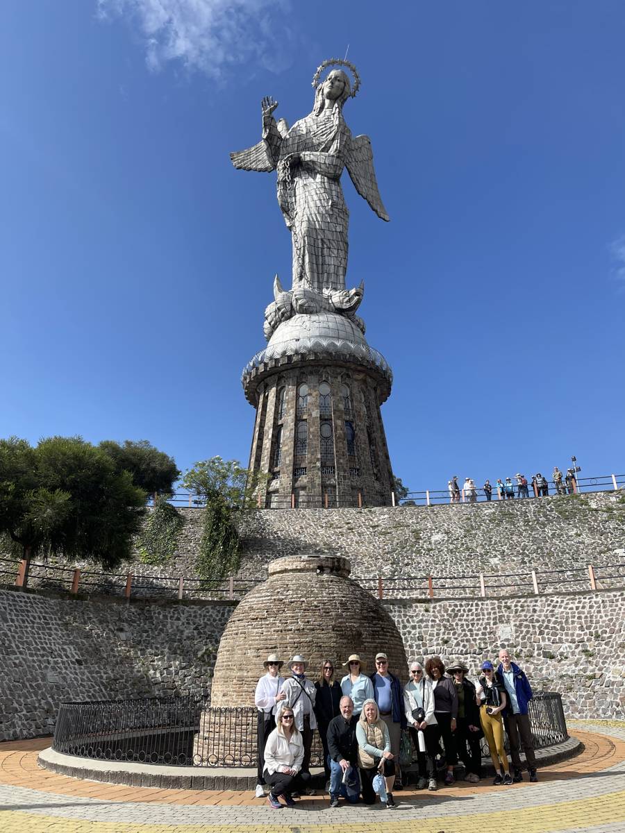 Cultured Travel group at the Virgen del Panecillo monument overlooking Quito, Ecuador