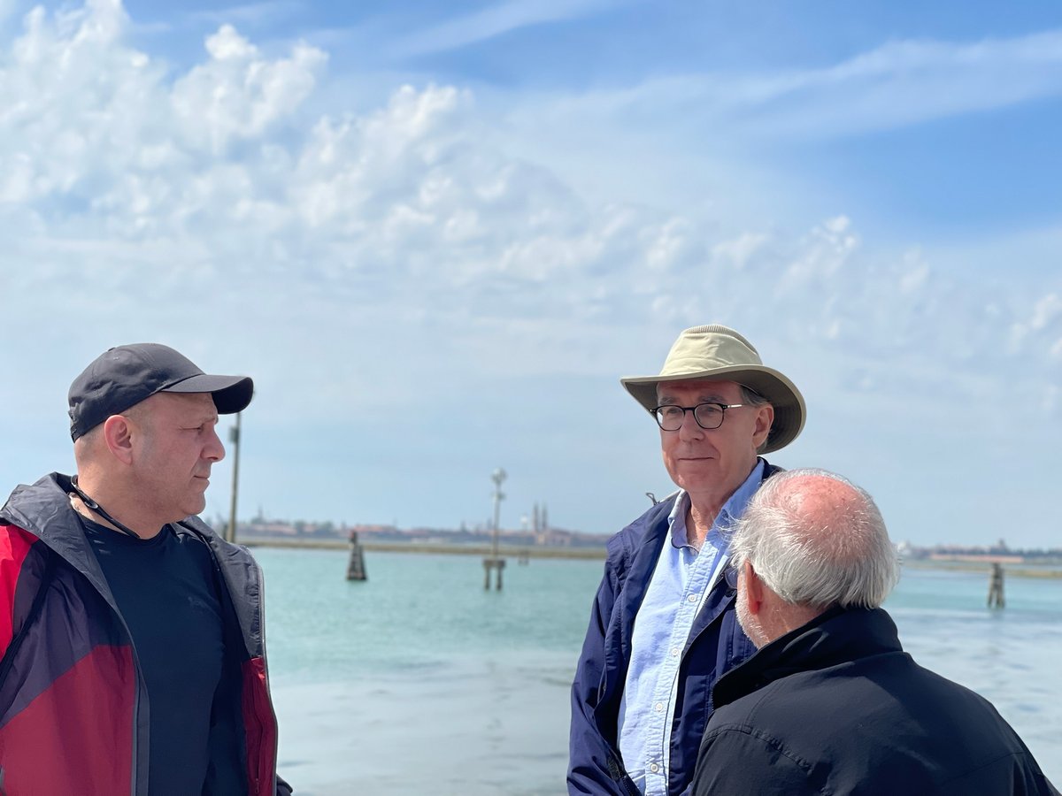Dr. Thomas Madden with travelers on the Venice lagoon